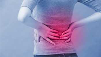 Can Supplements Really Damage Your Kidneys? -- Woman with kidney pain