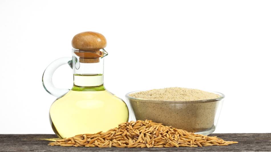 Arsenic in Rice & Rice Bran Oil -- bottle of rice bran oil, grains of rice and bowl of rice bran