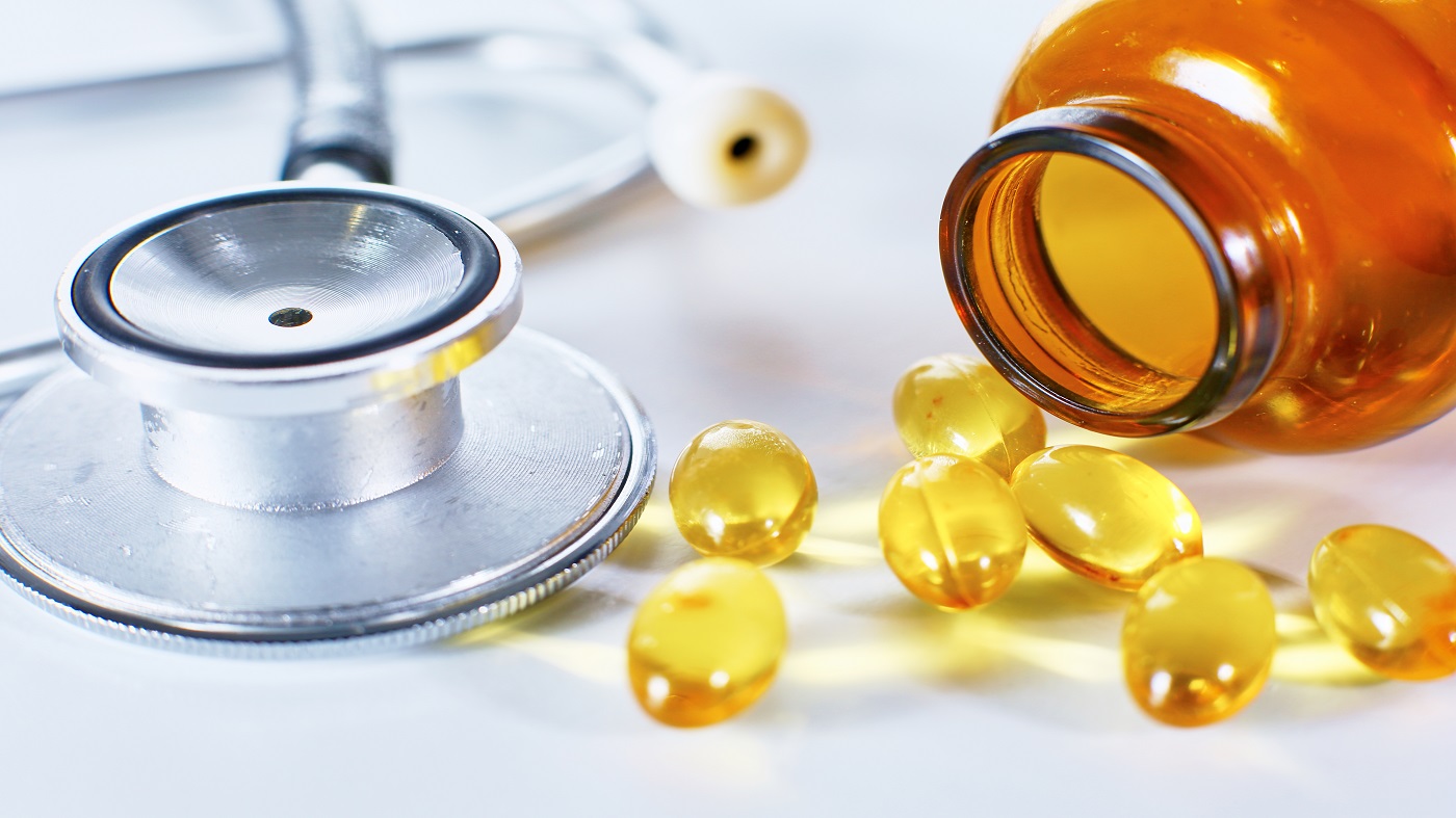 Fish Oil for Heart Health? -- fish oil capsules and stethoscope