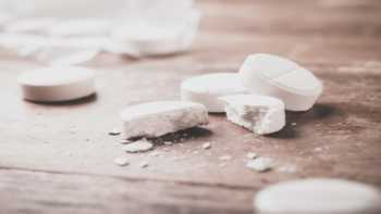 Titanium Doxide Safety -- close up of broken white pills