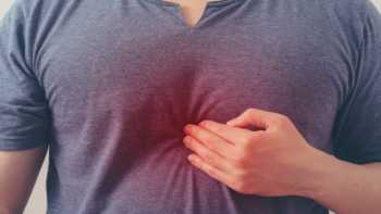 Supplements Making Acid Reflux Worse -- Man with acid reflux pain