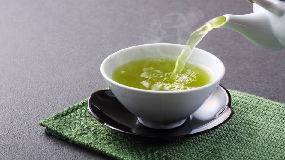 Heavy Metals in Tea From China -- pouring green tea into cup