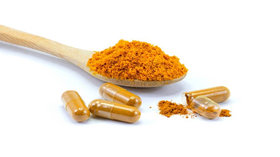 Lead Contamination in Turmeric Spice & Supplements -- Spoonful of turmeric spice and turmeric pills