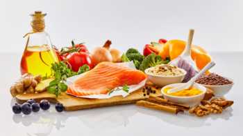 Low-carb & Mediterranean Diets for GERD? -- Table with Mediterranean foods such as fish, olive oil, walnuts, vegetables