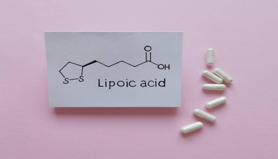 Chemical Structure of Alpha Lipoic Acid on Pink Background