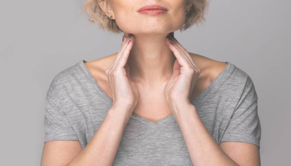 Elderly Woman Checking Thyroid Gland