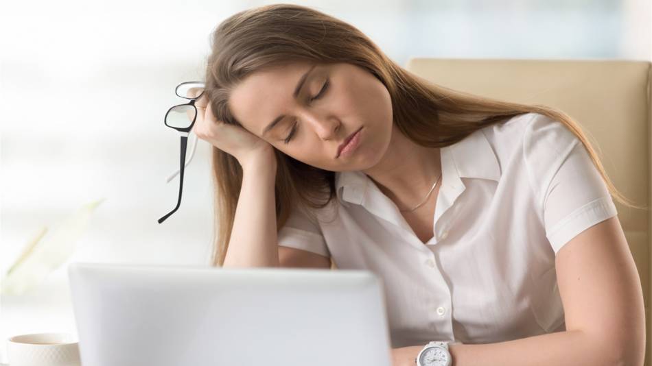 Adrenal Fatigue and Adrenal Support Supplements -- Tired Woman Falling Asleep at Her Desk