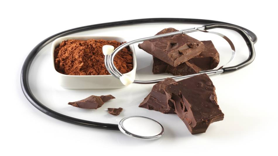The Benefits of Dark Chocolate -- Dark chocolate, cocoa powder and stethoscope