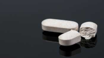 Talc in Vitamins & Cancer Risk -- broken white tablet