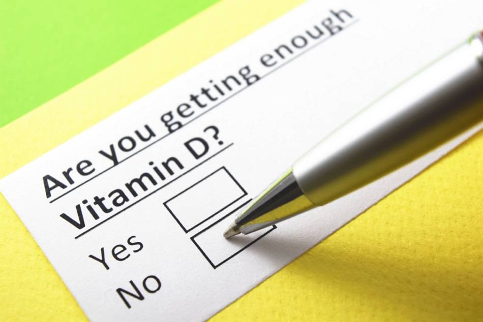 What are the symptoms of vitamin D deficiency?