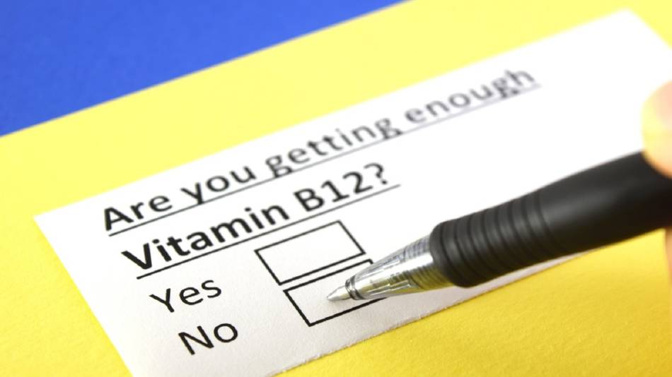 Symptoms of B12 Deficiency -- paper with question &quot;Are you getting enough vitamin B12&quot; and boxes to check yes or no