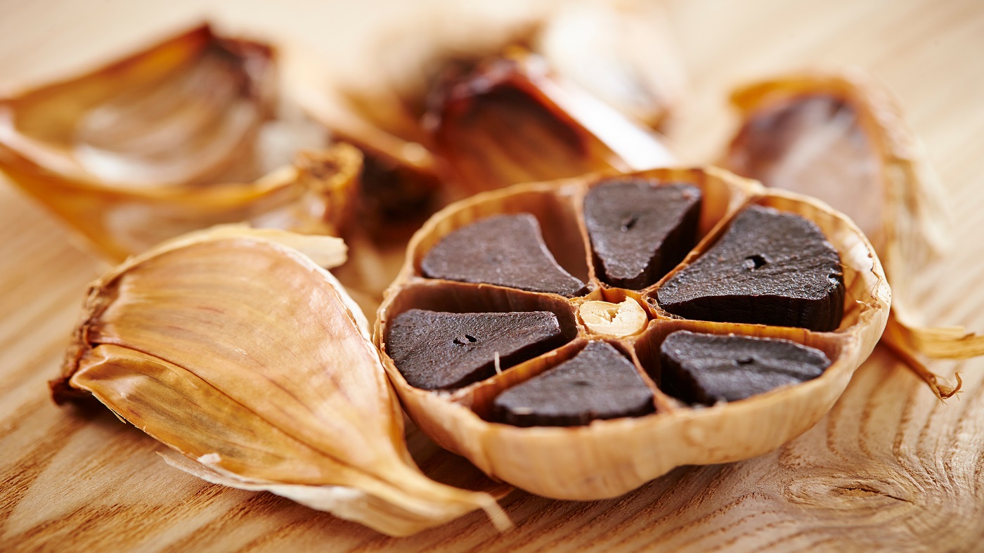 Black Garlic Health Benefits -- black garlic cloves up close