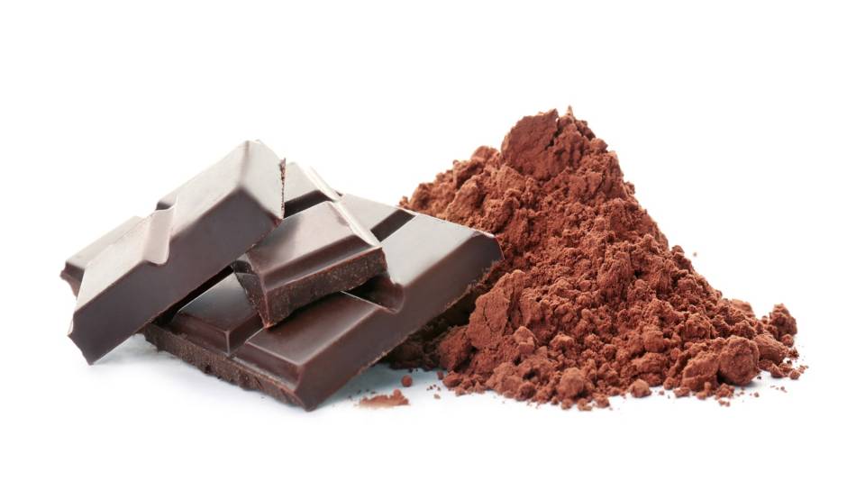 Can Cocoa and Chocolate Cause Kidney Stones? -- close-up of cocoa powder and dark chocolate bar 