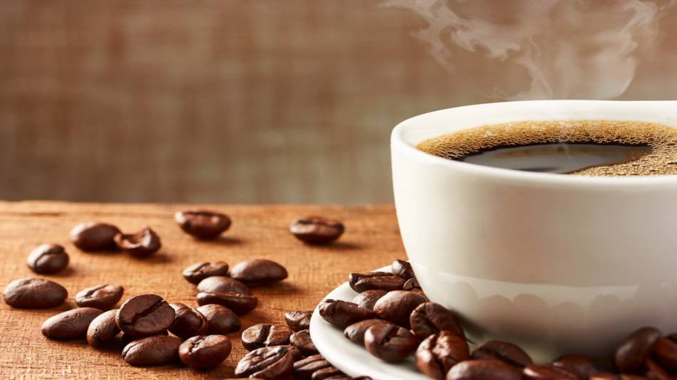 Coffee and Gallstones -- coffee in cup and coffee beans