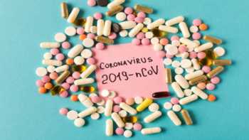 Coronavirus Risk With Supplements from China? -- 'Coronavirus' written on paper surrounded by supplements capsules and tablets