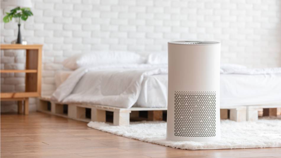 HEPA air purifier on bedroom floor