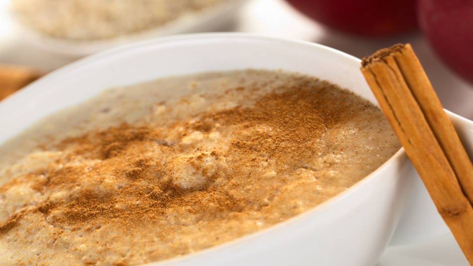 Liver Danger With Cinnamon -- Bowl of oatmeal with cinnamon and cinnamon sticks