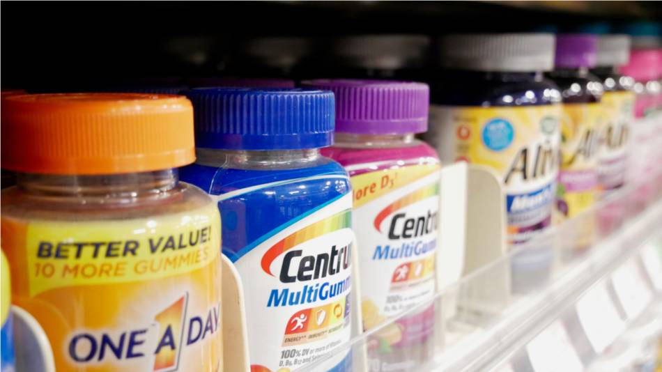 Multivitamins on pharmacy shelf